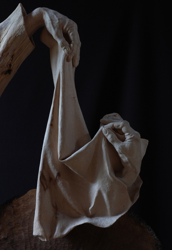 Sculptures of Hands in Wood, Marble and Stone.