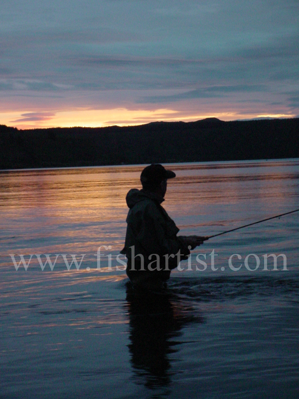 Sunset Taupo Fisherman. - Trout Fishing - Taupo New Zealand.