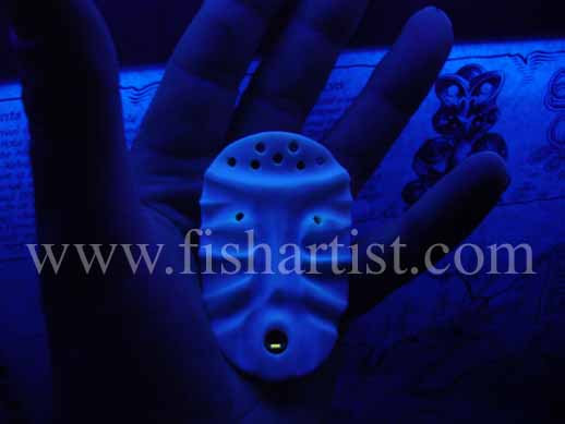 A Night Fishermans Fish God, - Fishing Bone Carvings.