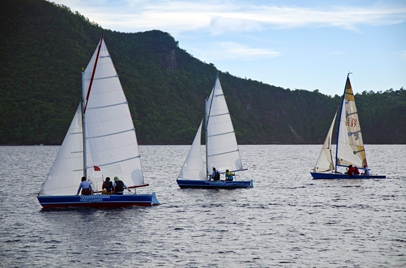 And coming back after a great days racing - Bequia Youth Sailors : Young Island Regatta