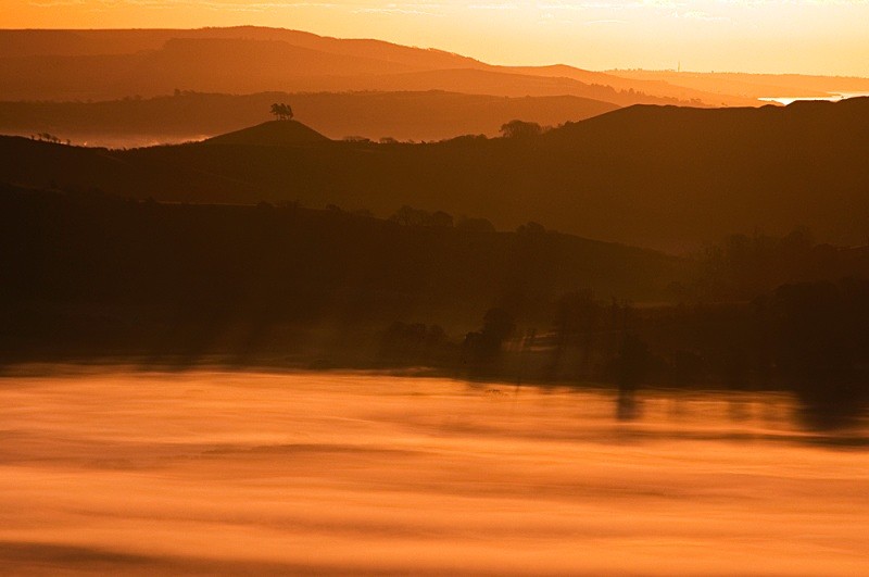 Sunrise through the mists over the Marshwood Vale