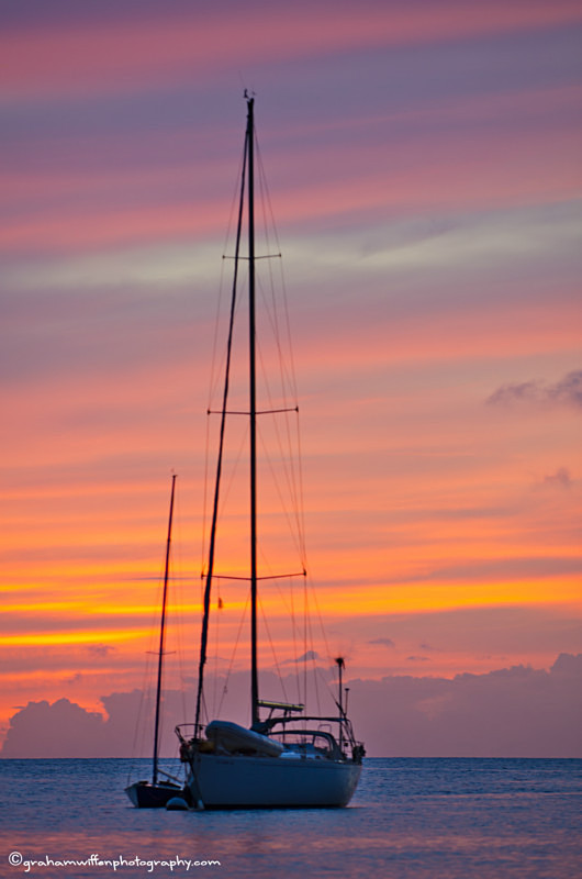 Sunset across yachts moored in the bay, Bequia