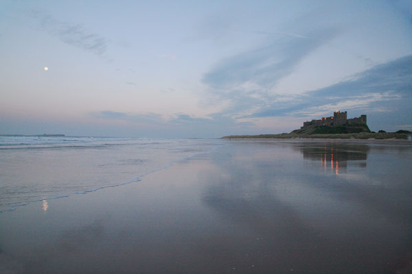 MOONRISE AND SUNSET BAMBURG MH - NORTHUMBERLAND