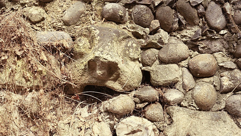 Gargoyle in wall, Dunwich, Suffolk - Suffolk Sojourns