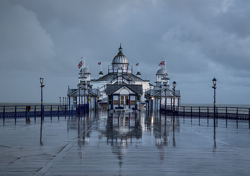 Eastbourne Pier in rain. - Coastal Britain