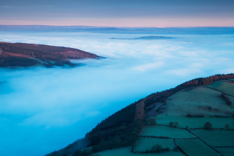 Mist in the valleys in the Brecon Beacons National Park, Wales.