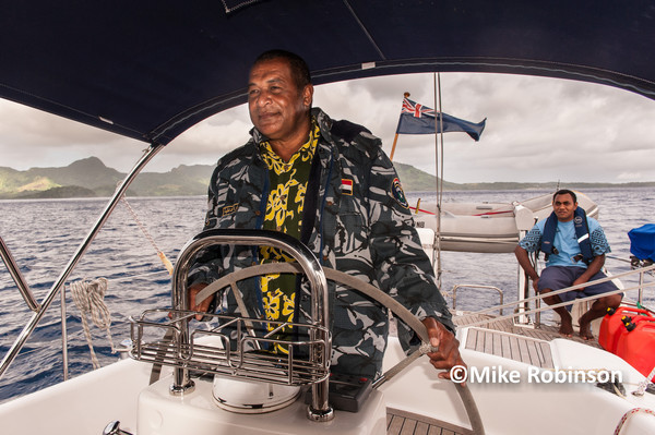 Pastor helming_2_sailing Matuku - Pacific Memories