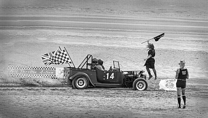 1C3A4083 sand and car composite 12 FINAL - mono full size - CROP2 - bu - RACE THE WAVES 2026