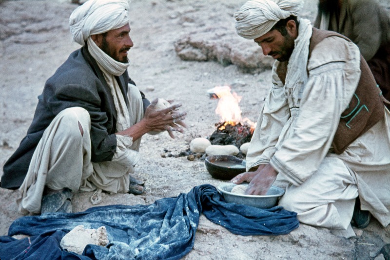 Pathan tribesmen making bread in Afghanistan