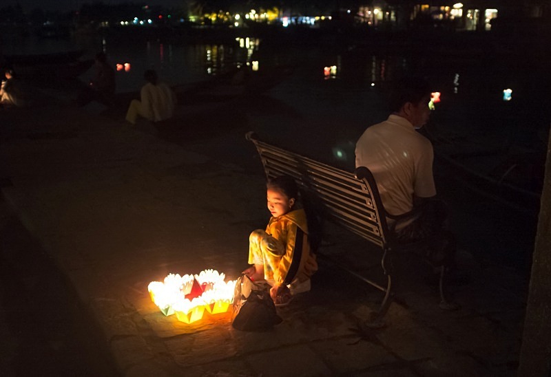 Hoi An - young seller of paper lanterns - Vietnam January 2013