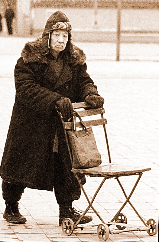 Old man in a Peking winter