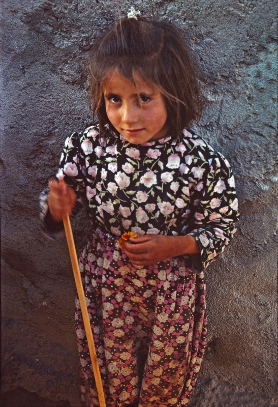 Afghan girl with flower
