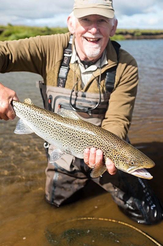 Mr Collings with a nice sea trout. - Fishing in Iceland's Laxa I kjos River. September 2020.