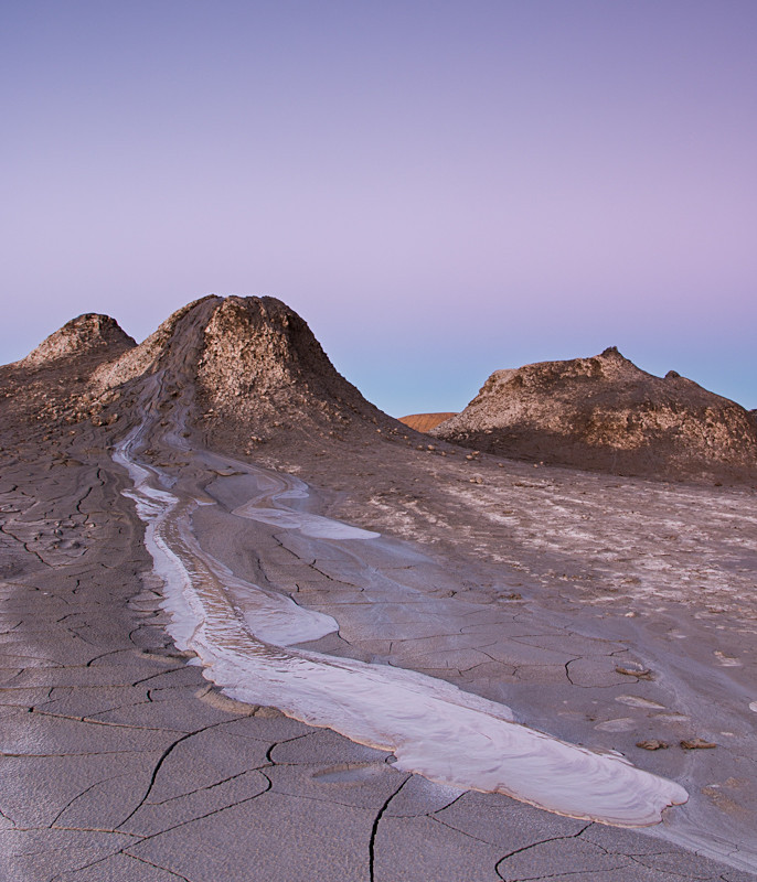 Earth shadow over the mud volcanoes