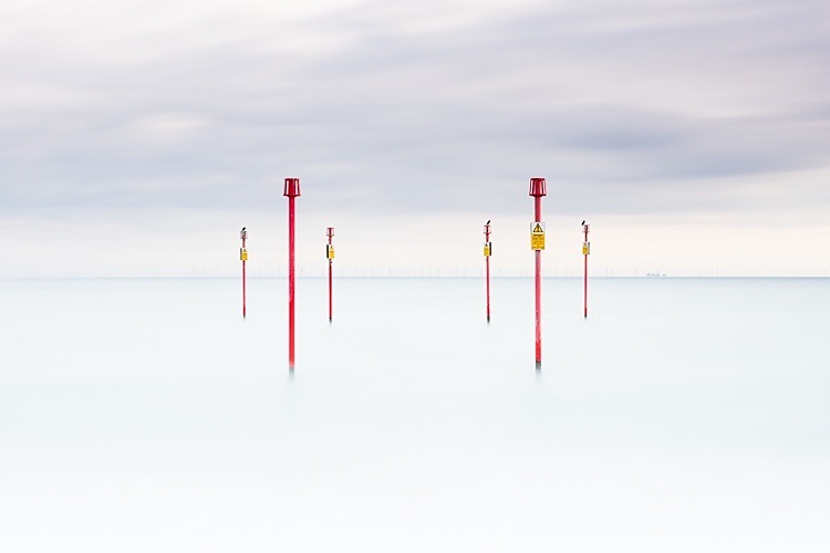 Posts on Southwick beach at high tide - Sussex