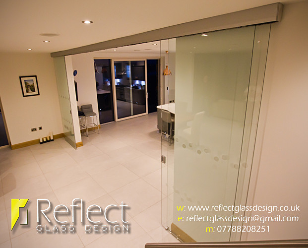  - Telescopic sliding glass doors