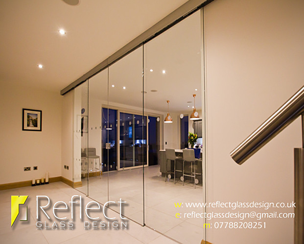  - Telescopic sliding glass doors