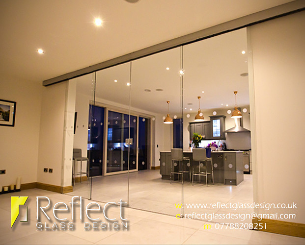  - Telescopic sliding glass doors