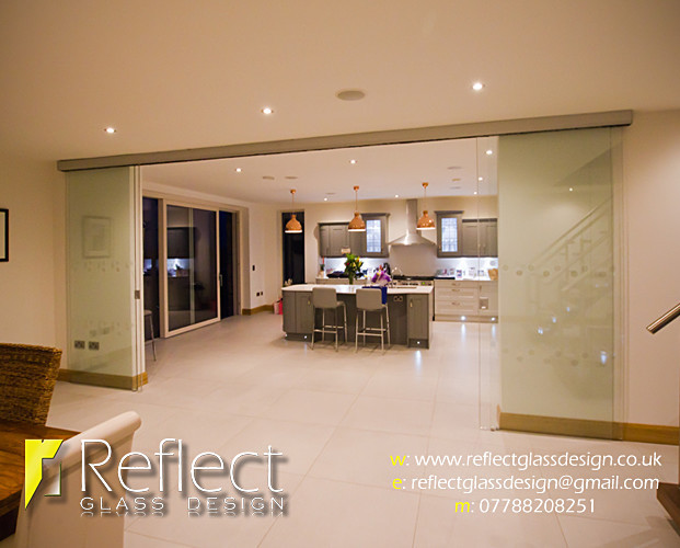  - Telescopic sliding glass doors