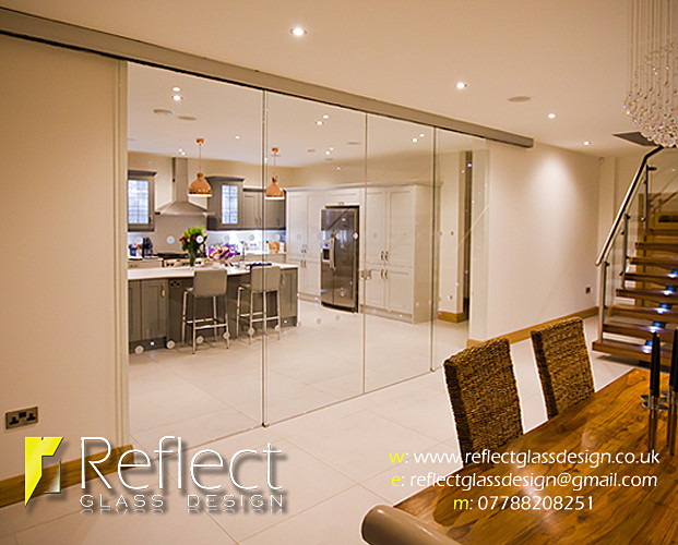  - Telescopic sliding glass doors