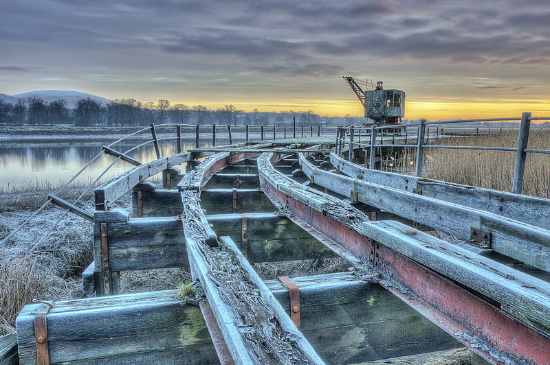 Badeath munitions crane on Admiralty pier at sunrise - Clackmannan & Stirlingshire