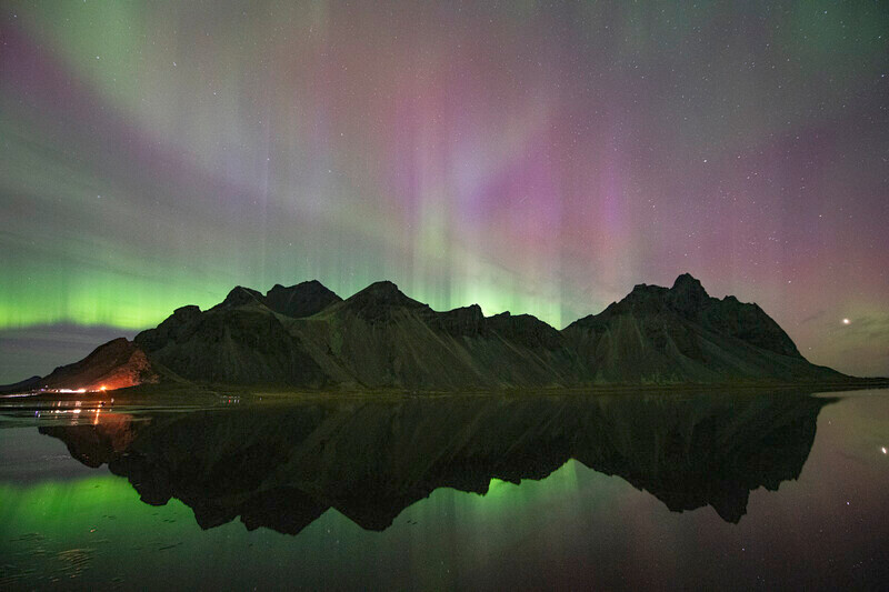 Auora at Vestrahorn. - South America and Iceland.