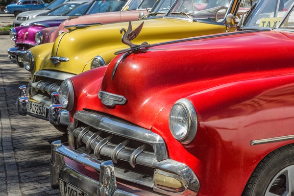 Line of brightly painted cars, Havana - Cuba