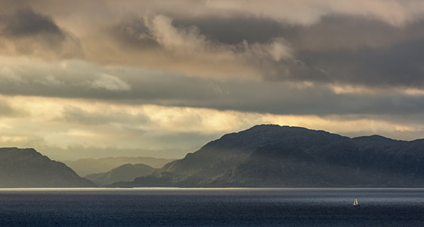 Light on the mainland from Eigg - Inner Hebrides - Skye and Eigg