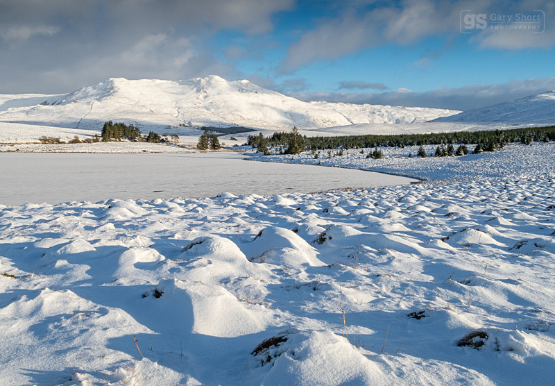 Frozen Llyn Tryweryn below Arenig Fawr - Snowdonia images