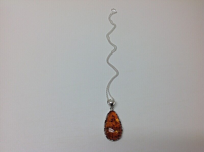 £63.00 including 16' silver chain - Amber Pendants