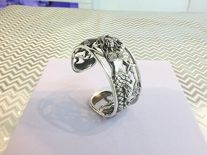 Silver mermaid design bangle.   £340.00 - Introducing our new silver collection