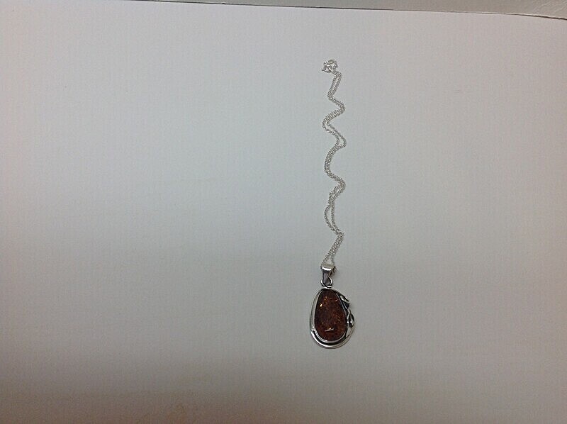 £56.00 including 16' silver chain - Amber Pendants