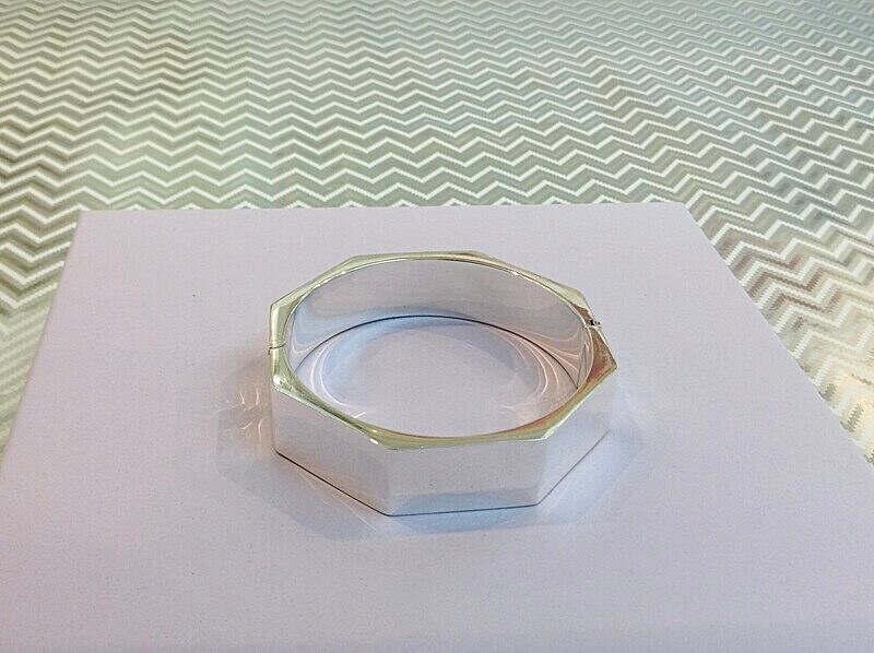 Silver hexagon shaped bangle.   £160.00 - Introducing our new silver collection