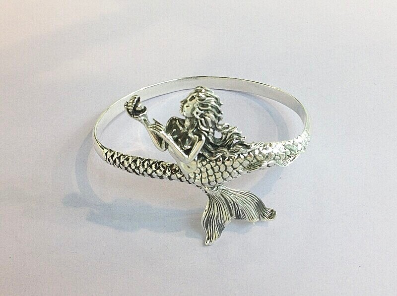 Silver mermaid design bangle.   £125.00 - Introducing our new silver collection