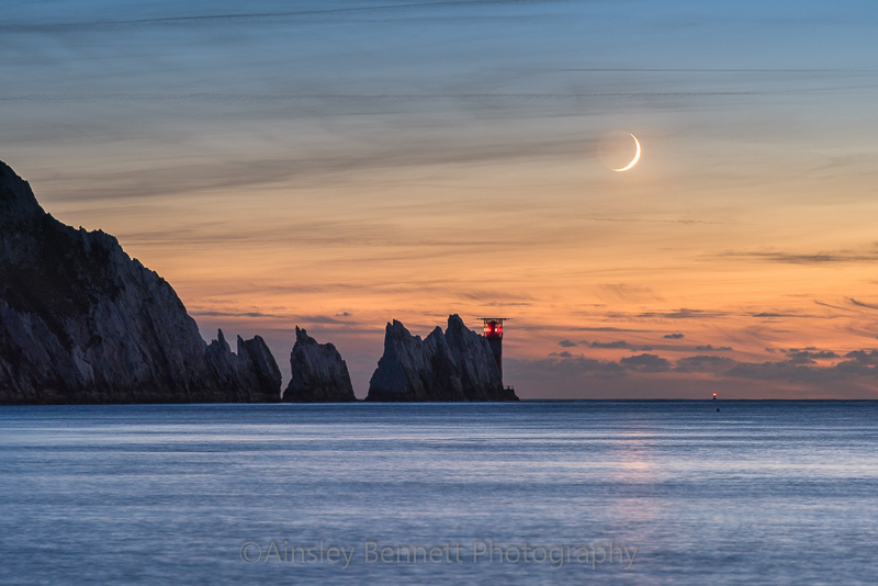 ab298 Crescent moon over the Needles - The Needles and Alum Bay