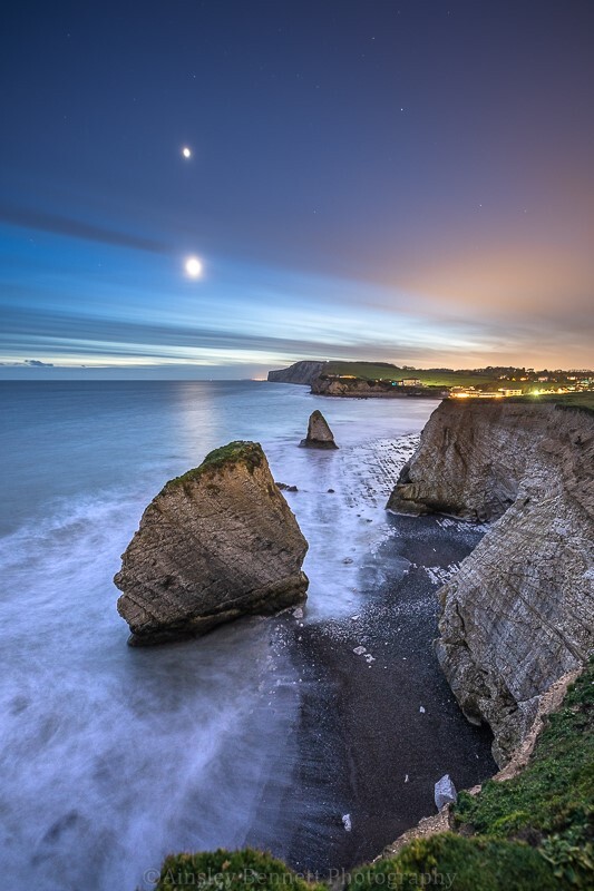 ab593 The Moon and Venus over Freshwater bay - The Isle of Wight by night
