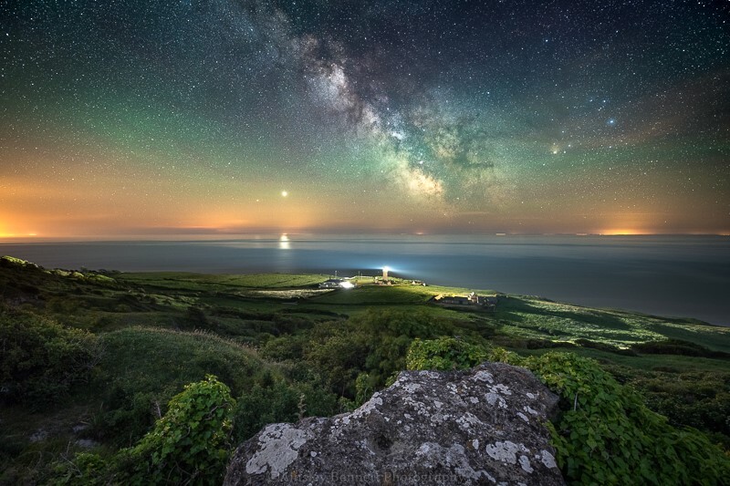 ab598 Night sky colours over St Catherines point - The Isle of Wight by night