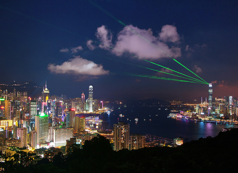 Laser show over the harbour from Braemar Hill - Hong Kong with the Aqua Luna Junk