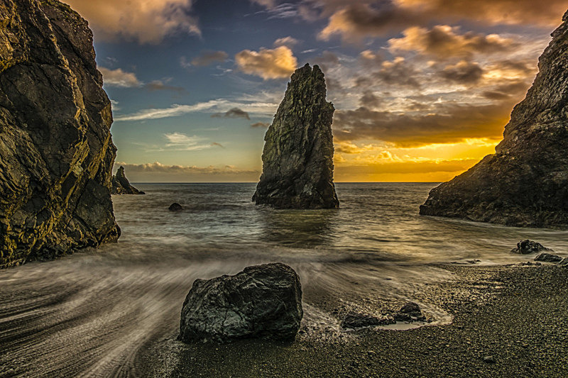 Sunset at Hidden Cove at Copper Coast Drive, County Waterford, Ireland - Sunsets