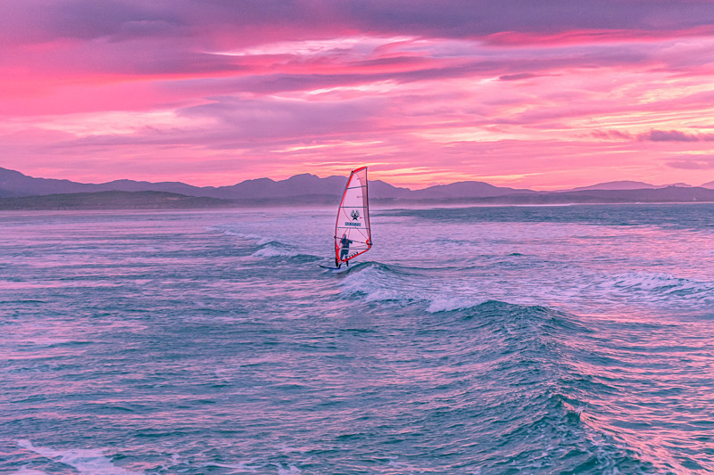 Surfer at sunset at Tramore beach, Ireland. - Pictures out of this world