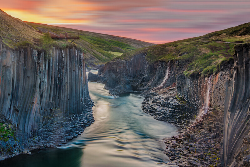 Midnight Sun at Studlagil Canyon, Iceland by Irish Photographer Adrian Hendroff - Outdoor Photography in Iceland