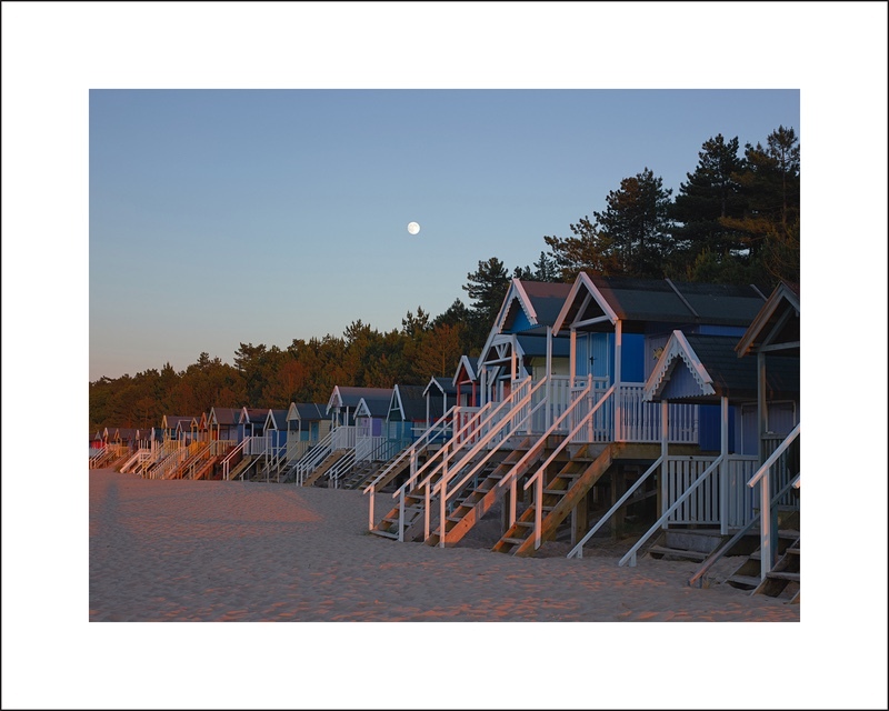 ‘Sundown and Moonrise Wells and Holkham Beach Huts