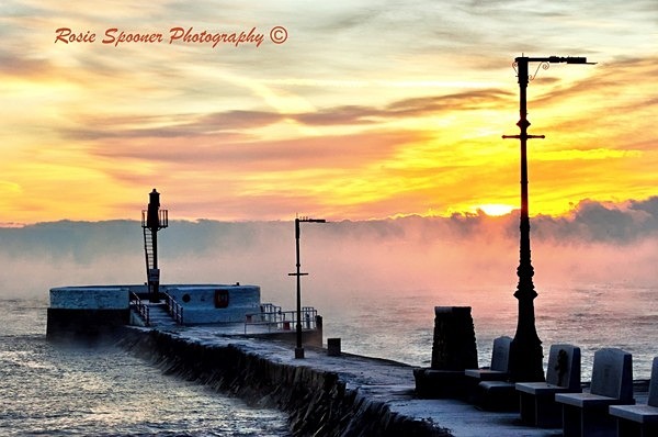 Sunrise and mist rising by The Banjo Pier - Photos of Looe