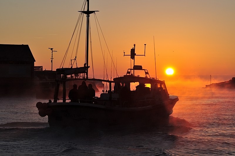 A fishing boat at sunrise - Photos of Looe