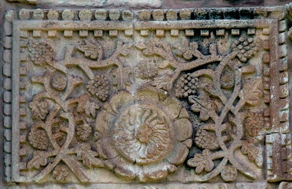 Bottom tier, sculpture niche relief (far left) - Façade