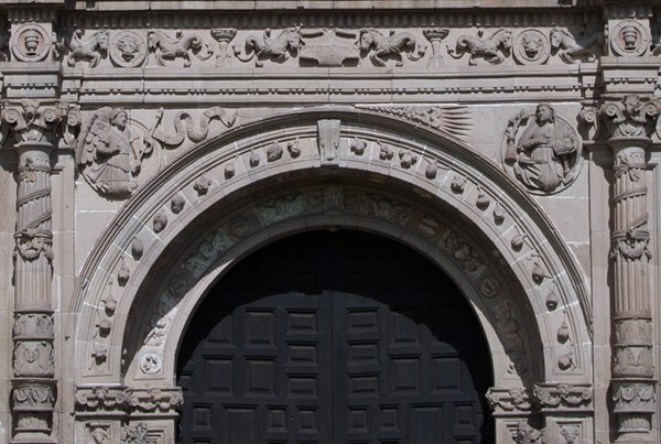 Façade portal, double archivolt & spandrels - San Agustín, façade