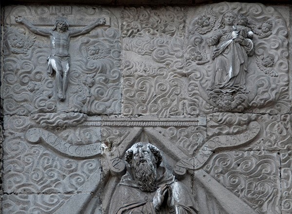 Façade, central relief, Vision of St. Augustine, details - San Agustín
