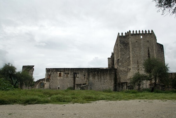 Apse - Façade, exterior buttressing, lateral portal, open & posa chapels, atrio & cross