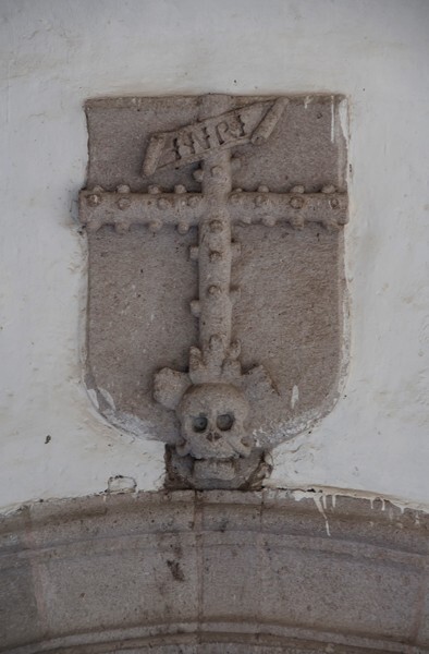 Portería cloister door relief, Calvary Cross - San Juan Bautista, façade, portería & posa chapels