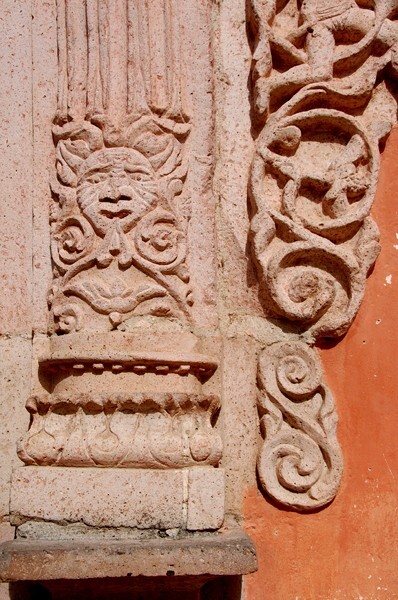 San Juan Bautista, façade portal, right pillar base relief - Victoria, Guanajuato